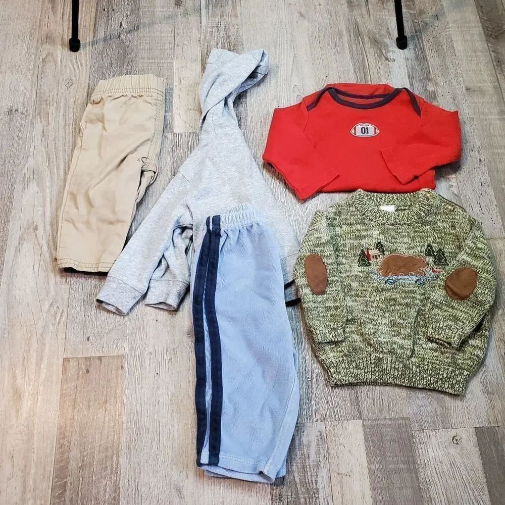 assortment of 6 month baby clothes